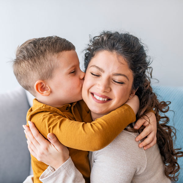 A Mother and Her Young Son After His Special Needs Pediatric Dental Treatment in Pflugerville, TX.